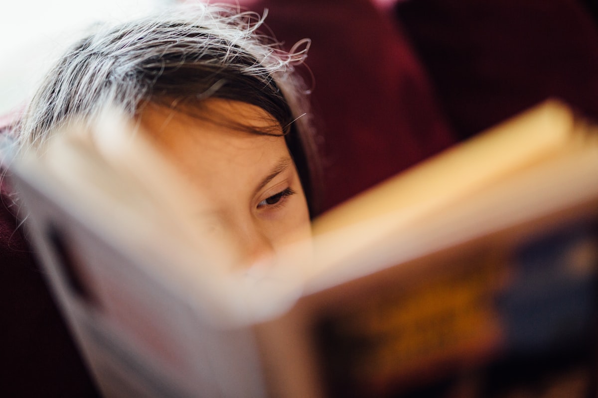 A child studying with focus